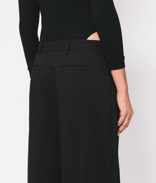 BLACK LS BODY SUIT | SOMETHING VERY SPECIAL SOMETHING VERY SPECIAL BLACK LONG SLEEVE BODY SUIT