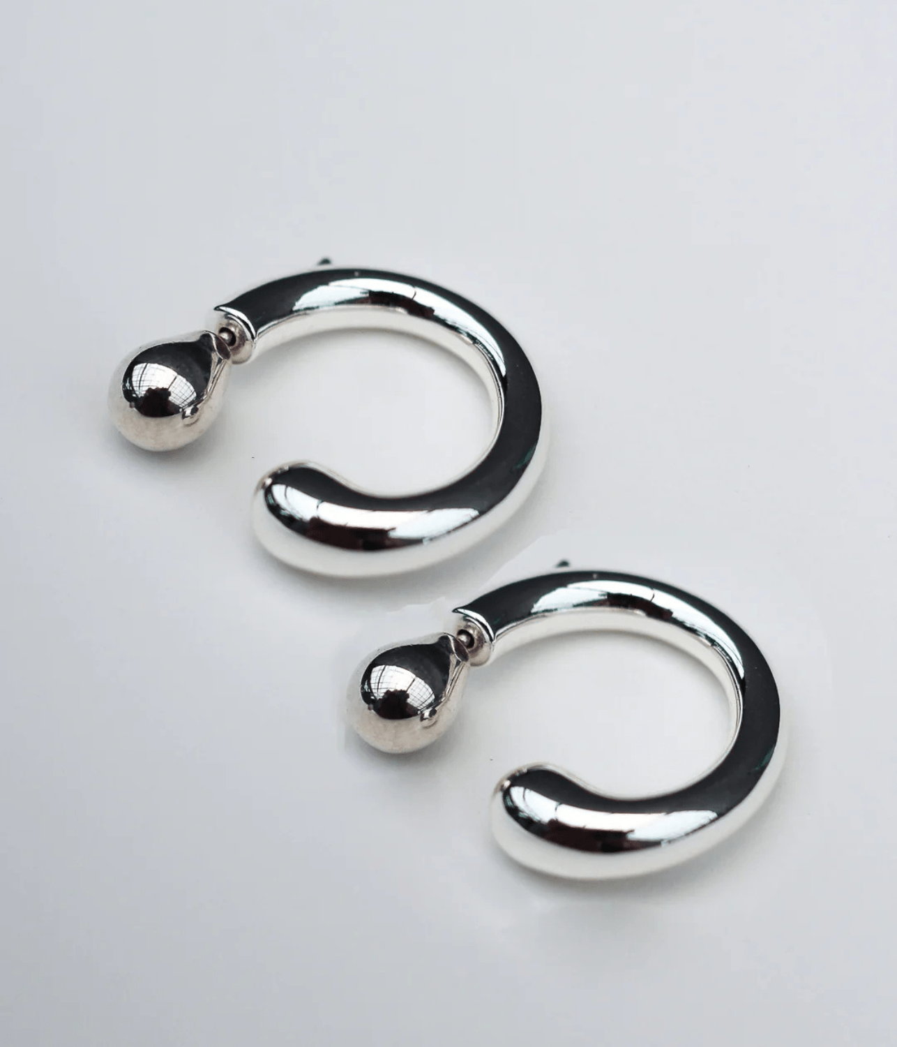 REVERSED HOOPS SILVER | F + H STUDIOS F+H REVERSED HOOPS SILVER